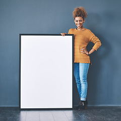 Image showing Marketing, poster and blank board with copy space being held by happy African woman sharing a banner for networking and advertising. Cheerful woman showing empty placard for logo design