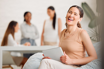 Image showing Businesswoman, team leader or manager on a tablet working at a female only company or women empowerment workplace with colleagues in background. Corporate professional with business success portrait