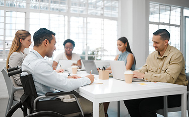 Image showing Team analyzes research discussing and marketing data while planning strategy in startup agency. Group of diverse business people sharing ideas together around a table in a marketing office boardroom