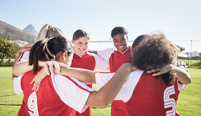 Image showing Female soccer, football or team huddle for support, motivation or celebration circle on sports field. Diverse group of fitness, teamwork and happy girls, friends or athletes at training match or game