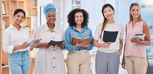 Image showing Team of female digital marketing or social media planners working in a creative agency for online seo or website design. Portrait of empowering women in diverse workplace with good ideas and strategy