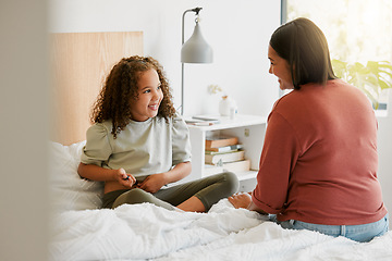 Image showing Caring mother teaching child to take insulin injection by herself looking happy, proud and brave at home. Little girl injecting self with blood sugar measuring device to test for chronic illness