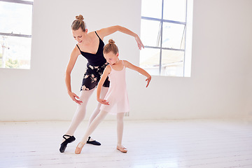 Image showing Ballet, elegance and dancing instructor teaching a little ballerina movement and posture at a dance studio. Teacher bonding with a child while learning performance routine and grace, classical art