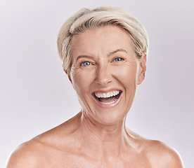 Image showing Skincare, wellness and face of senior woman with big smile in beauty, cosmetics or makeup portrait isolated on a studio background. Happy old lady or model with flawless anti aging skin care