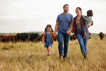 Image showing Farmer family, cow farm and bonding mother, father and children on environment or countryside sustainability agriculture field. Happy people and kids walking by cattle for meat, beef or food industry