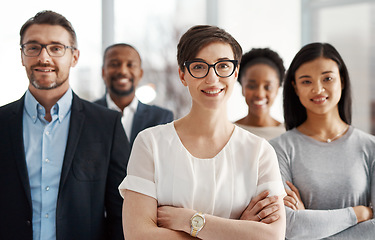 Image showing Smiling and modern team of business workers happy about teamwork collaboration and success. Portrait of successful office group ready to work. Colleagues standing together with a sense of community