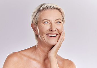 Image showing Skincare, grooming and beauty with a mature woman happy with her skin after a facial or treatment. Senior female feeling confident and relaxed, enjoying selfcare routine and healthy, natural texture