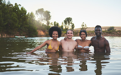 Image showing Friends couples and lake swimming together in summer or spring in bikinis on a fun vacation. Happy, relaxed and diverse young people enjoy the freedom, river and dam outdoors on a nature vacation