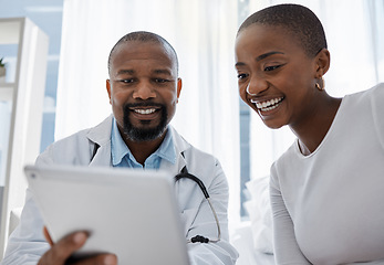 Image showing Doctor, good news and medical patient at hospital healthy black woman got her test results after consulting. Smile, happy and healthcare professional worker support, helping and working in his office