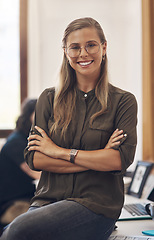 Image showing Proud, confident and ambitious portrait of smiling leader at desk looking professional. Elegant, fashionable and successful woman with stylish glasses has a presentable style at the office.