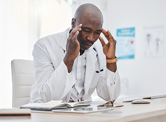 Image showing Medical healthcare, doctor or GP with headache, stressed and tired working with a problem, bad mental health or stressful day. Burnout, exhausted and overworked professional surgeon in hospital.