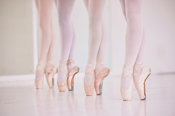 Image showing Many ballet feet, legs or tiptoe of elegant dancers dancing and practicing in a dance studio. Closeup of ballerinas or performers or team preparing or learning for a group performance in a class