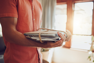 Image showing Recycling newspaper and magazine, sustainability and the planet and environment, green and clean energy for happy future. Man with paper and rope bundle, recycle and reuse in eco friendly modern home