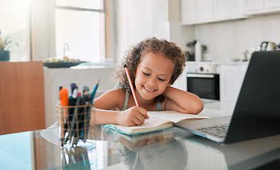 Image showing Homework, education and student online learning writing and drawing in her kindergarten school notebook at home. Smile, happy and creative girl studying, fun and working on laptop via house internet