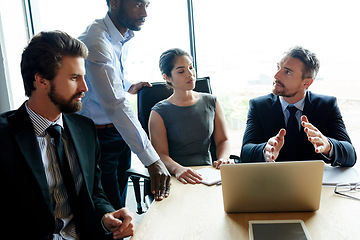 Image showing Thinking, talking and leadership team collaboration of business workers in a boardroom meeting. Serious office group work together on finance strategy. Corporate investment team working on a project