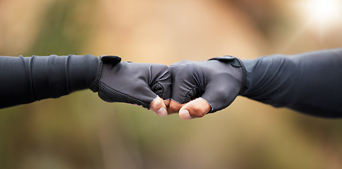 Image showing Fist bump, motivation and workout success of fitness friends after sports training in nature. Closeup of a hand gesture doing an exercise goal showing community, support and teamwork collaboration