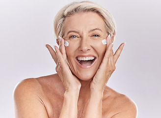 Image showing Beauty, skincare and wellness with a senior woman excited about health and motivation for sunscreen, face serum and skin care. Studio portrait of a happy model clean after a shower, happy and healthy