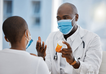 Image showing Doctor with mask, covid patient and pills or medicine, drugs and treatment in medical consultation, checkup or visit. Talking, hospital consulting or sharing knowledge with woman in healthcare clinic