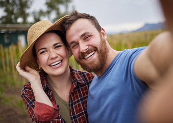 Image showing Smile, selfie and nature of happy couple in the countryside smiling, bonding and taking a photo together. Smiling man and woman embracing life, love and relationship in a natural outdoor background.