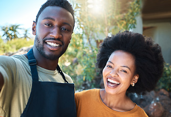 Image showing Trendy couple taking selfie outdoors in summer for memories or for sharing on social media. Small business owner or sommelier taking photo with happy customer service influencer or vlogger