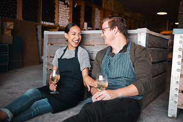 Image showing Laughing couple, wine tasting date and drinking alcohol with glasses in remote farm distillery, winery estate or countryside. Happy, flirt or bonding interracial man and woman enjoying vineyard drink