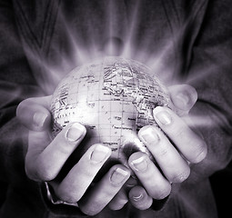 Image showing Globe in a girl's hands