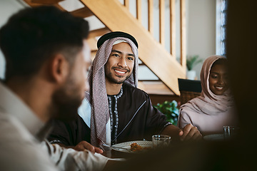 Image showing Muslim, arab and islamic man enjoying a meal for eid, ramadan or breaking fast with family while celebrating religion, holy culture and islam faith. Happy, smiling and spiritual guy eating lunch