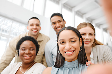 Image showing Selfie with fun friends in the office, working together as a team of business people and professional colleagues. Closeup portrait of a diverse corporate group with a mindset and mission of growth