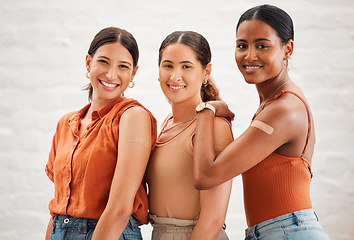 Image showing Covid vaccination or flu shot inside of girl friends, female friendship and teenagers smiling. Portrait of a happy and diverse friend group standing and practicing good health habits together