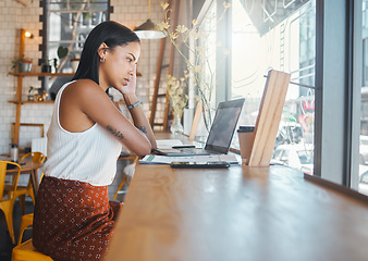 Image showing Stressed, thinking and working woman on a laptop at a cafe, watching a video or receiving bad news on a video call. Serious student studying at a coffee shop, reading an email online.