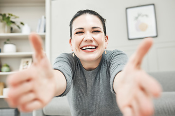 Image showing Happy, smiling and laughing woman reaching out her arms for a hug, embrace or holding while relaxing alone at home. Portrait of a relaxed, content and cheerful female giving embrace and being playful