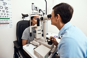 Image showing Eye and vision test, exam or screening with an optometrist, optician or ophthalmologist and a patient using an ophthalmoscope. Testing and checking eyesight for prescription glasses or contact lenses