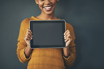 Image showing Woman holding digital tablet with a blank screen, copy space or chromakey for online advertising. Creative female with plain touch screen, branding for business logo or news and marketing.