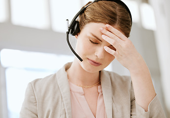 Image showing Burnout, headache and stressed call center agent working with problem, bad mental health or stressful job. Female sales representative or advisor feeling overworked, tired and exhausted