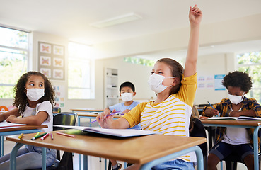 Image showing Learning, education and classroom in covid pandemic with students wearing face mask for protection against the spread of the virus or diseases. Clean inside school with dedicated and smart children