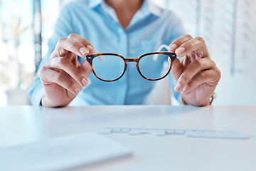 Image showing Glasses, eye care and eyewear or optometry eyeglasses for woman with disorders and myopia. Closeup hands of customer buying, purchasing and testing stylish prescription spectacles in clinic and shop