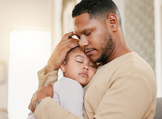 Image showing Father hugging sleeping daughter, caring for sick child and family giving loving embrace at home. Girl child resting with parent, people napping together and recovering from sickness at house