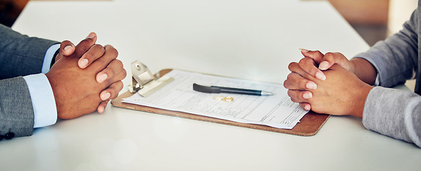 Image showing Couple hand sign legal divorce documents, contract or paper deal in a lawyer office with ring placed on table. Woman and man with signature on marriage paperwork after agreement at family law office