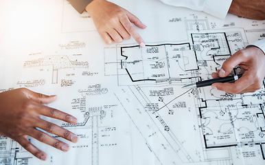 Image showing Hands of architects, engineers and building construction workers planning project with blueprint in meeting at work, working on house and talking with document. Creative designer with paper at table