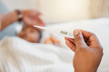 Image showing Covid, sick and hand holding thermometer closeup at home or hospital. Sick person with coronavirus or flu infection in their body. Ill health, headache and medical fever test with monitor in bed.