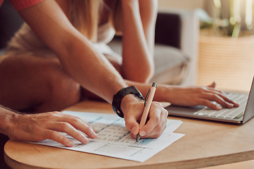 Image showing Couple calculating budget, finance and tax while planning investment, loan and bills on writing paper and laptop at home. Managing household spending, savings and insurance report for online banking