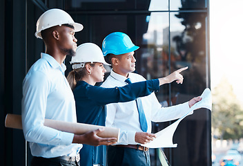 Image showing Construction, architecture and management of project planning. Blueprint, design and engineers meeting to discuss work strategy. Professional team, leadership and efficiency on the building site.