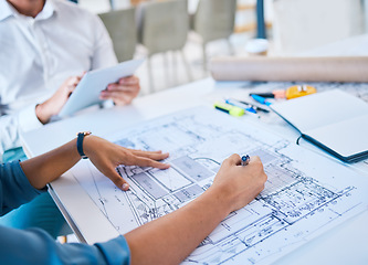 Image showing Architect sketching, designing blueprint or doing architecture, engineering or structure drawing on paper at a work studio with hands closeup. Business person working on a design project development