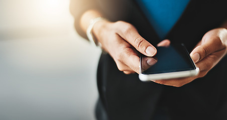 Image showing Trendy business women texting on phone, reading text messages and looking at latest trends on social media. Marketing professional browsing internet on cellphone or online app with copy space closeup