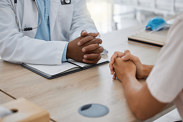 Image showing Hands, healthcare and consultant of doctor talking to patient at a desk at the hospital or clinic. Medical, health or worker consulting insurance, test results and documents for medicine at work.