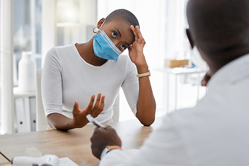 Image showing Stressed, post covid or sick patient at a doctor appointment due to covid symptoms and headache. Covid19 fatigue and unhealthy woman talking to healthcare or medical worker about at a hospital