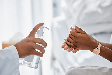 Image showing Doctor giving patient hand sanitizer for covid protection, hygiene and protocol in hospital or clinic. Healthcare safety, flu germs and cleaning hands to prevent sick, bacteria virus and health risk