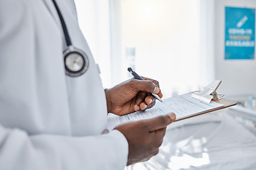 Image showing Medical, insurance and doctor filling out patient history for diagnosis at the hospital. Healthcare professional working on clipboard with paper, consulting and writing health paperwork at a clinic.