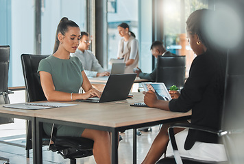 Image showing Office corporate business female employees, coworkers and team working online with digital electronics. Diverse advertising and social media marketing company or agency staff busy with client work