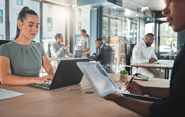 Image showing Business workers, teamwork and working on a laptop, tablet or technology together. Corporate businesspeople in office, collaboration and planning or strategy research in a modern office.